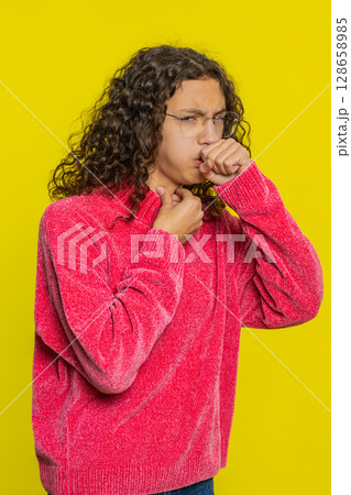 Unhealthy ill girl coughing with seasonal flu symptoms, sick, allergy, fever or viral infection 128658985