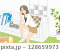 リビングで猫とくつろぐ女の子 128659973