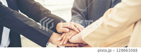 Banner diversity solidarity team multiethnic Partners hands together teamwork. Group of multiracial meetings joins hands together. Panorama Diversity people hands join empower trust team solidarity 128661088