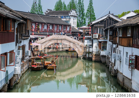 boat port by bridge with people visit city god temple, Zhujiajia, Shanghai 128661638