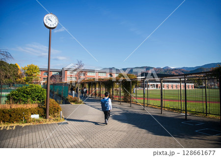 Japanese students walk to Elementary and High school, Kyoto 128661677