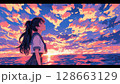 夕焼けを眺める女子高生 128663129