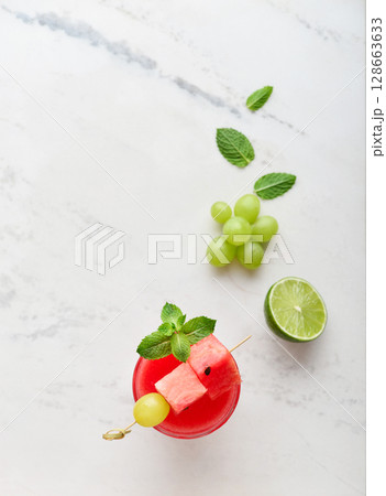 Fresh watermelon juice with mint and lime Fresh watermelon juice with mint and lime 128663633