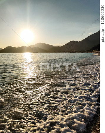 beautiful landscape of a sandy beach on the sea beautiful landscape of a sandy beach on the sea 128665330