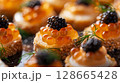 Close-up of Caviar with Quail Eggs, featuring halved quail eggs topped with luxurious caviar and garnished with dill 128665428