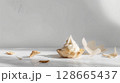 Foie Gras Mousse in pastry shell on white background with negative space, emphasizing texture and garnishes 128665437