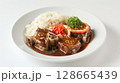 Ginger-Soy Veal Osso Buco on White: Rich Broth, Vibrant Pickled Ginger, Steamed Jasmine Rice 128665439