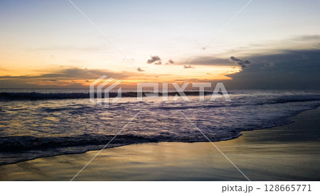 beautiful dramatic landscape of sunset on the sea beach beautiful dramatic landscape of sunset on the sea beach 128665771