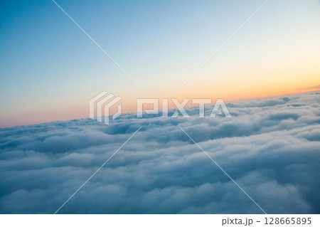 beautiful thick clouds in the sky from the height of the plane beautiful thick clouds in the sky from the height of the plane 128665895