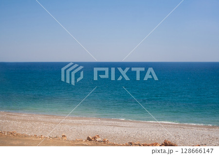 beautiful landscape of a sandy beach on the sea beautiful landscape of a sandy beach on the sea 128666147