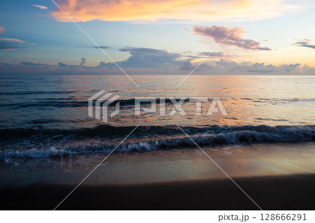 beautiful dramatic landscape of sunset on the sea beach beautiful dramatic landscape of sunset on the sea beach 128666291