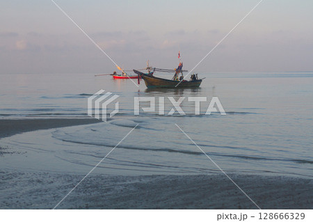 fishing motor boats moored on the sea coast fishing motor boats moored on the sea coast 128666329