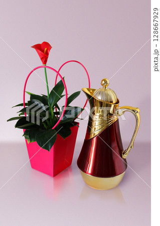 vase with flowers and jug 128667929