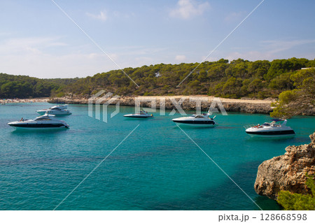 beautiful ships and boats are moored near the shore 128668598