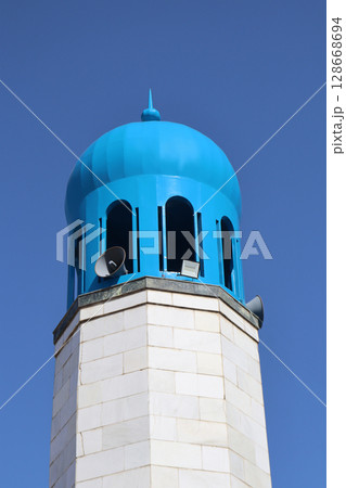 white building against the blue sky white building against the blue sky 128668694