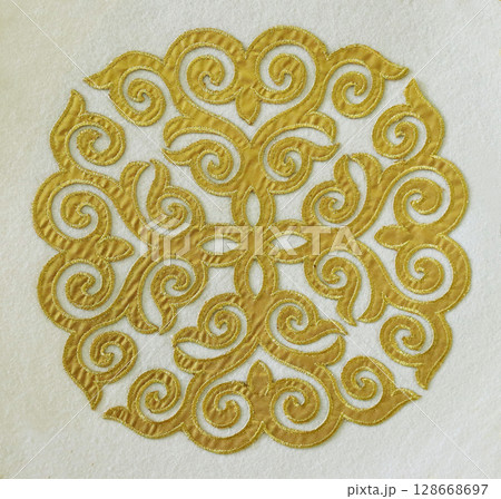 golden pattern on concrete background 128668697