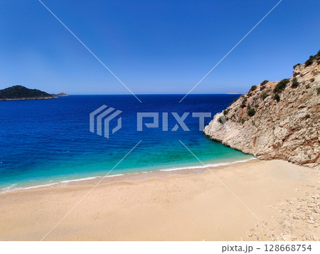 beautiful landscape of a sandy beach on the sea beautiful landscape of a sandy beach on the sea 128668754