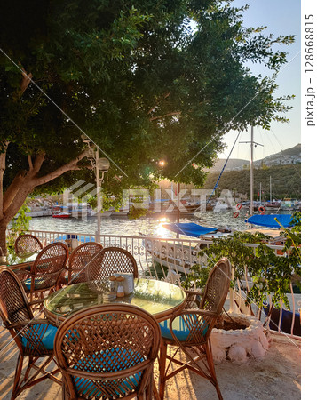 beautiful ships and boats are moored near the shore 128668815