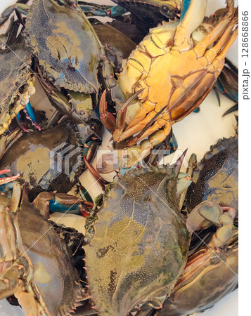 many colorful crabs on the counter in the store many colorful crabs on the counter in the store 128668866