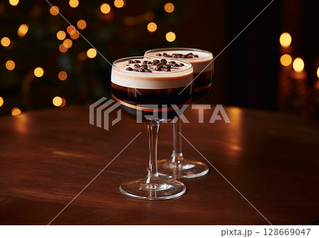 Glasses of espresso martini cocktail with coffee beans on wooden bar table.Macro.AI Generative. 128669047