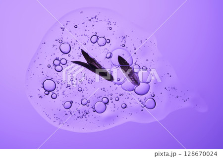 A drop of shampoo with bubbles. A texture with a leaf in it. A drop of shampoo with bubbles. A texture with a leaf in it. 128670024