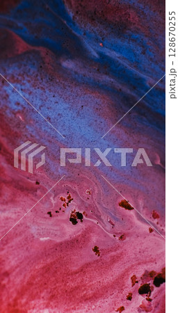 Blend flow. Color water. Defocused blue maroon pink marble particles fluid paint liquid spreading on abstract art creative background. Blend flow. Color water. Defocused blue maroon pink marble particles fluid paint liquid spreading on abstract art creative background. 128670255