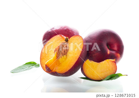 Bright ripe nectarines in studio shooting without background 128671015