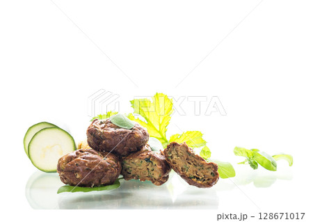 Zucchini muffins on a white background isolated Zucchini muffins on a white background isolated 128671017