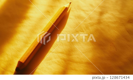 A Pencil and Golden Light. A Pencil and Golden Light. 128671434