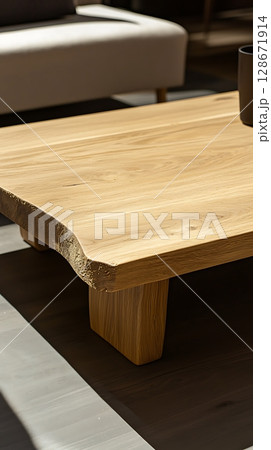A wooden coffee table with a vase on top of it 128671914