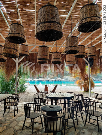 beautiful interior of a restaurant on the seashore beautiful interior of a restaurant on the seashore 128672052
