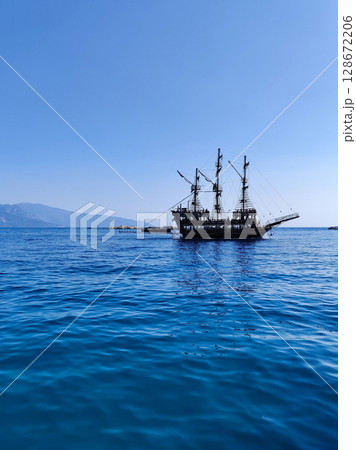 a beautiful ship is sailing in the blue sea 128672206