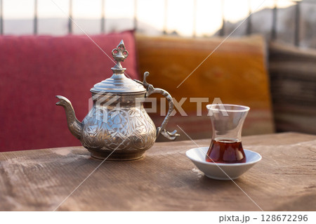 traditional turkish black tea on table with teapot traditional turkish black tea on table with teapot 128672296