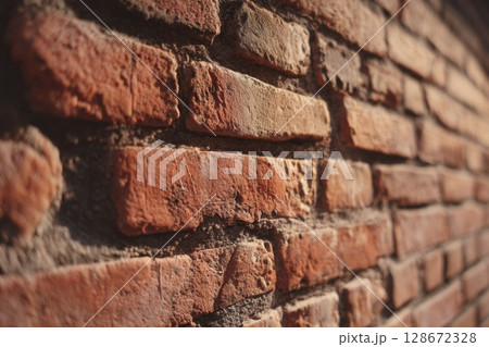 Aged red brick wall with rustic texture and natural weathering, ideal for architecture, restoration, or heritage masonry detail references Aged red brick wall with rustic texture and natural weathering, ideal for architecture, restoration, or heritage masonry detail references 128672328