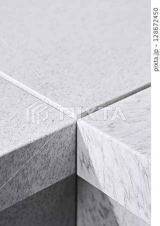 A white marble table with a white border 128672450