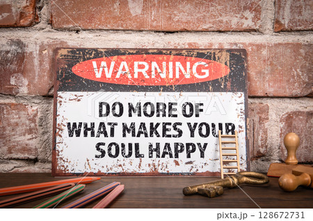 Vintage Inspirational Sign Saying Do More of What Makes Your Soul Happy on Rustic Background 128672731