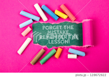 Inspirational Quote About Learning from Mistakes Surrounded by Colorful Chalk on Pink Background 128672822
