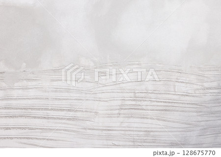 Concrete plastering wall and scrate surface to prepare for tile installation. 128675770