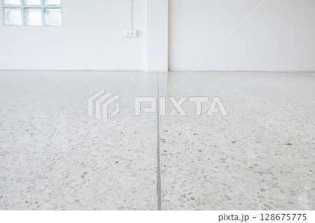 Terrazzo floor and dividing strips suit for background. Terrazzo floor and dividing strips suit for background. 128675775