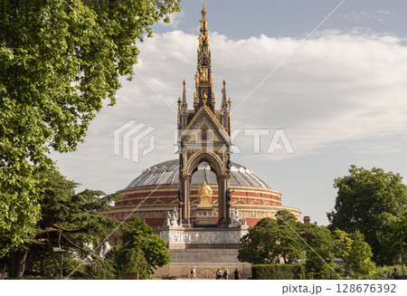 the Albert Memorial in Kensington Gardens with the Royal Albert Hall visible directly behind it. the Albert Memorial in Kensington Gardens with the Royal Albert Hall visible directly behind it. 128676392