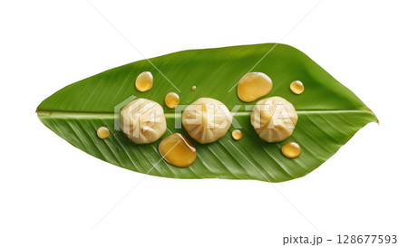 Modaks on green leaf for Ganesh Chaturthi, created with AI, PNG 128677593