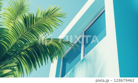 Modern minimalist east style window building with blue tone wall and greenery palm plant decoration 128679462