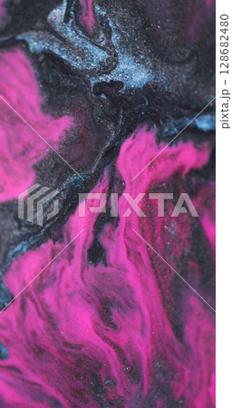 Paint spill. Water mix. Defocused blue purple pink color sparkling dark black glitter liquid on abstract creative acrylic background. Paint spill. Water mix. Defocused blue purple pink color sparkling dark black glitter liquid on abstract creative acrylic background. 128682480