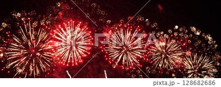 Banner Red Firework celebrate anniversary happy new year 2024 4th of july holiday festival. Banner red firework night time celebrate national holiday. Countdown new year 2025 festival with copy space 128682686