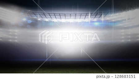 Image of bright light from spotlights on sports stadium 128683151