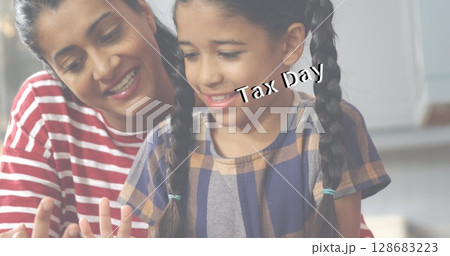 Image of tax day text over biracial woman with her daughter 128683223