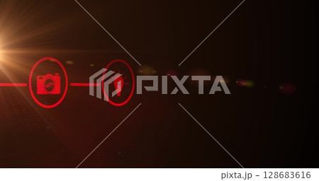 Digital image of network of digital icons over spot of light against red background 128683616