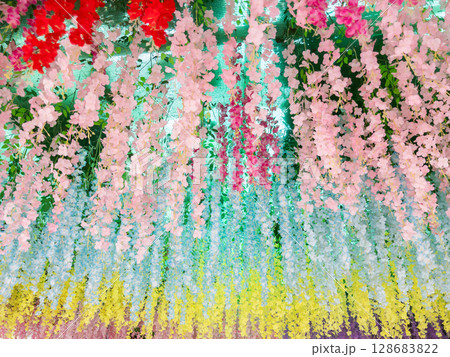 Vibrant Artificial Flower Decor at Temple Archway. 128683822