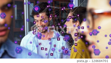 Image of network of connections over diverse business people in office 128684701