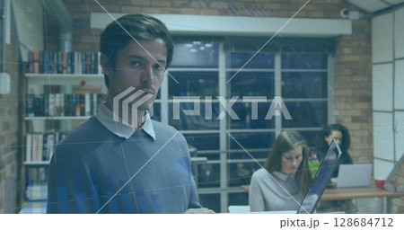 Image of data processing over diverse business people in office 128684712